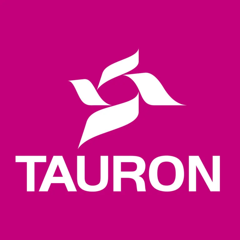 Logo TAURON z stylizowanym symbolem na magentowym tle